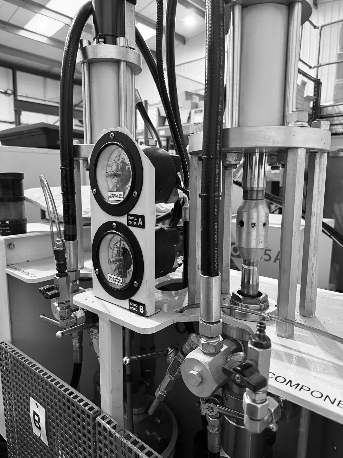 The silicone injector feeding the BOY 55 LSR machine