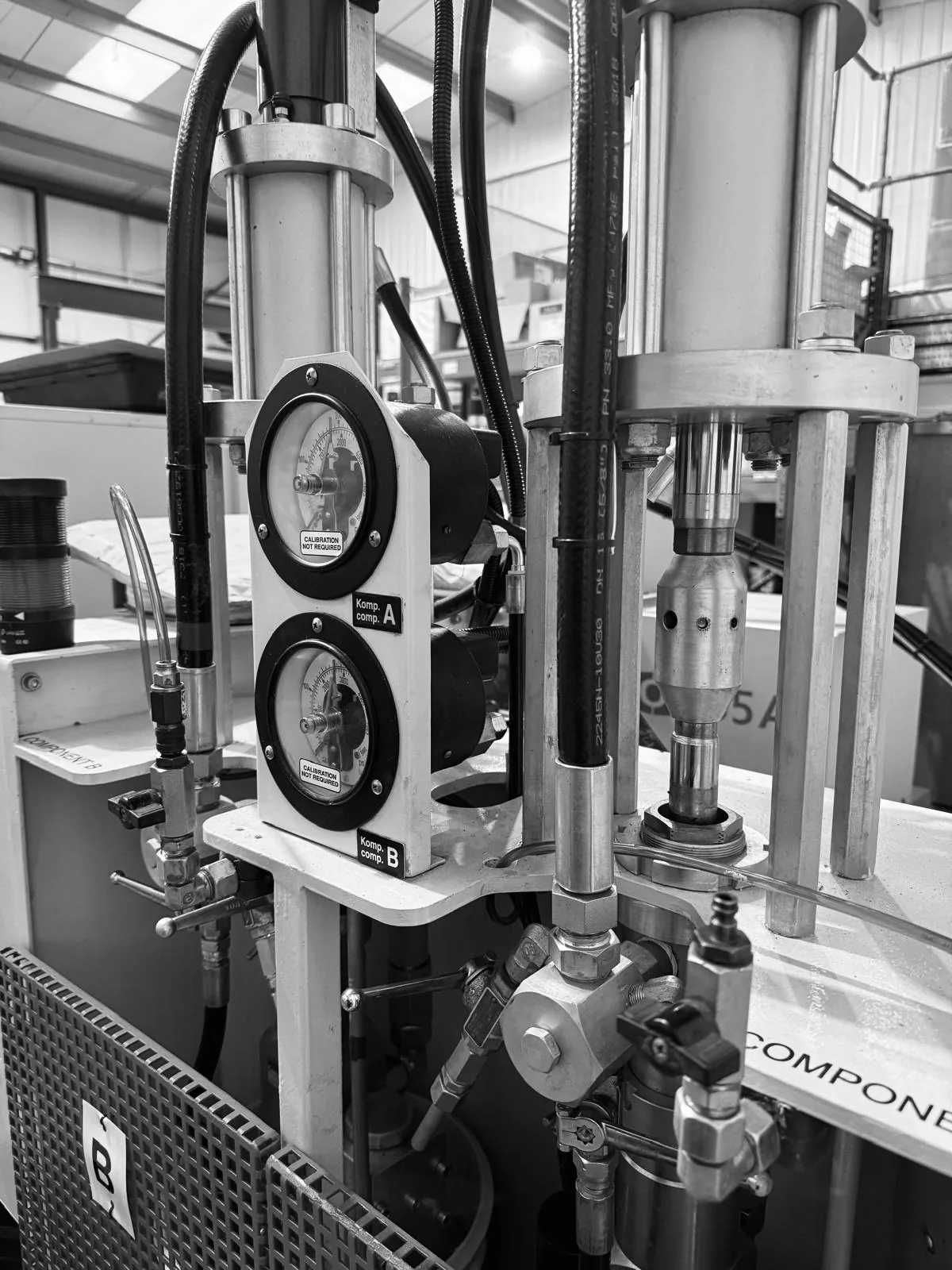The silicone injector feeding the BOY 55 LSR machine