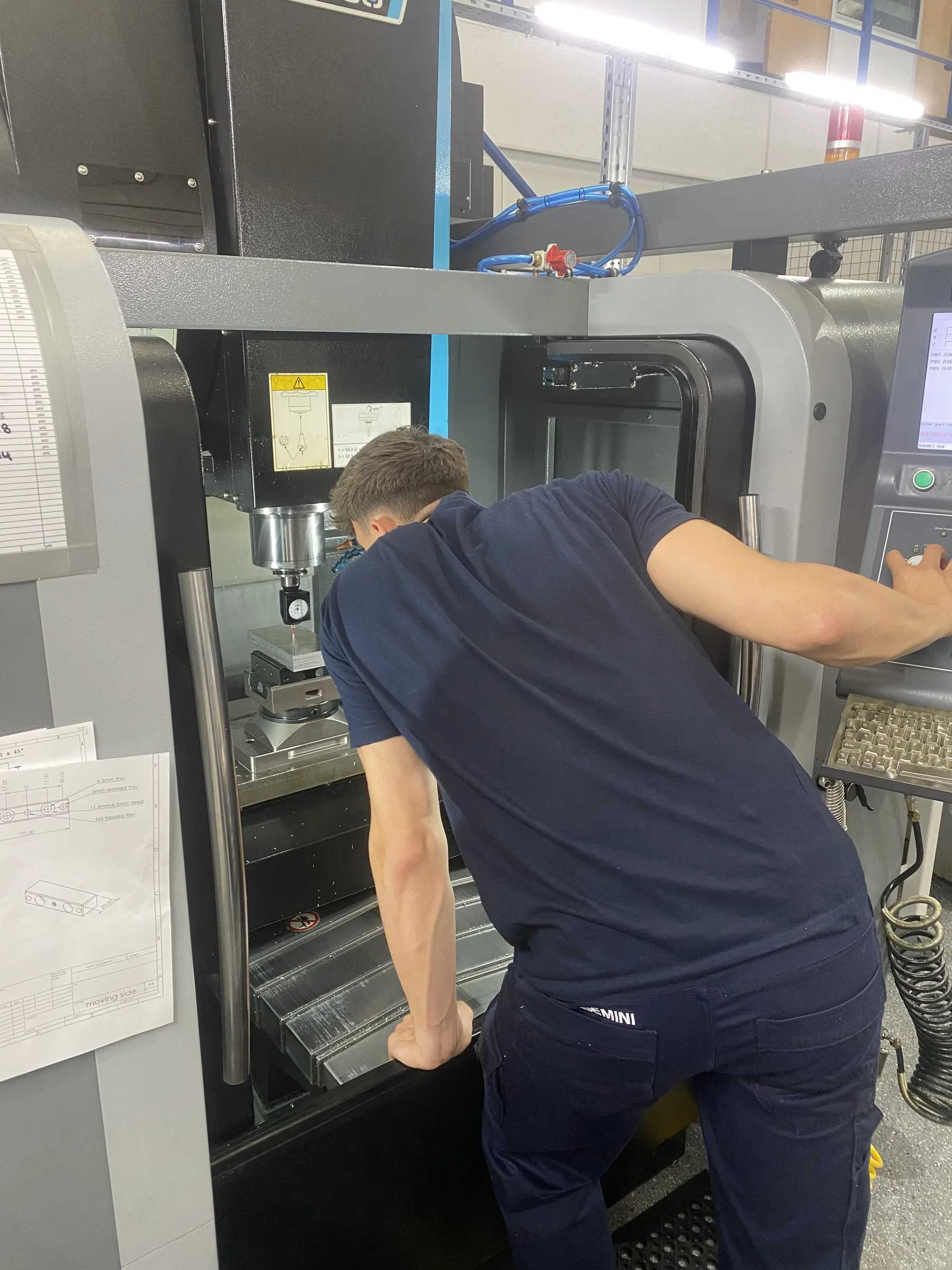 Machinist working at a Hurco CNC machining centre