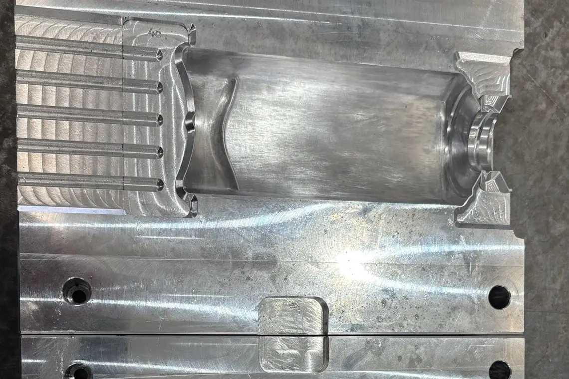 A machined aluminium mould tool cavity in Gemini's tool room